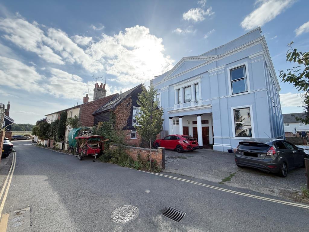 Lot: 5 - FORMER OFFICE AND BEDSITS WITH POTENTIAL CLOSE TO THE QUAY - View if the building the road leading to the Quayside